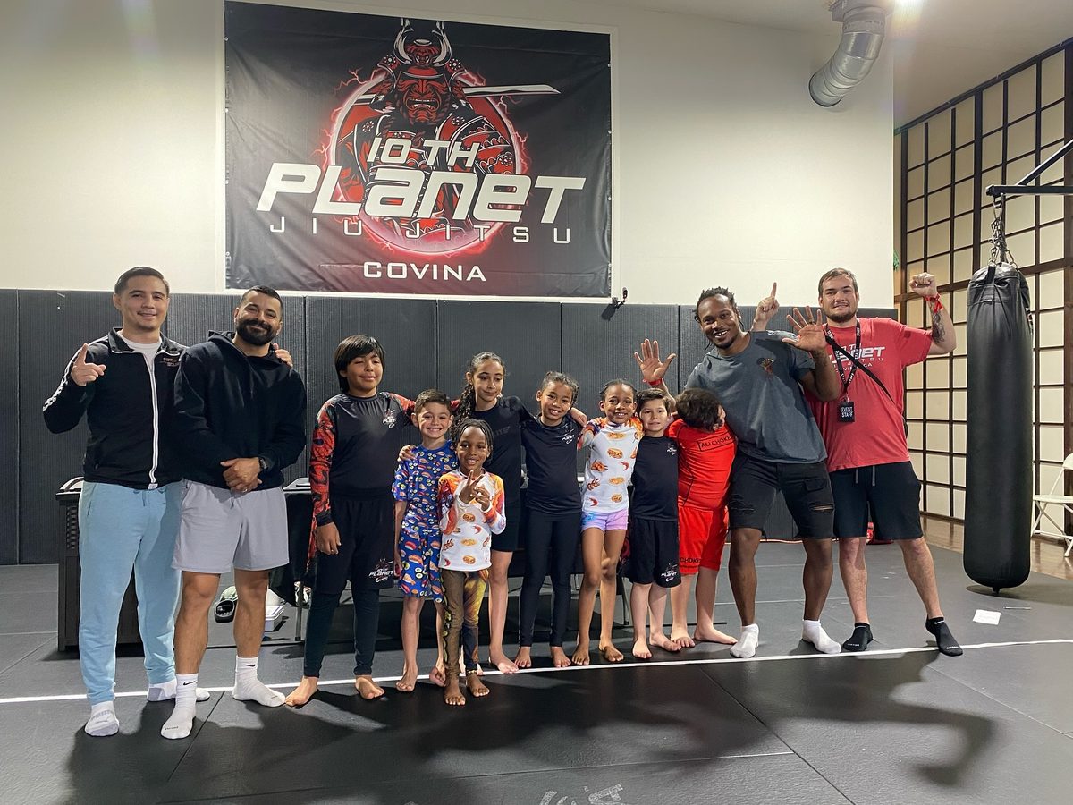 Kids jiu jitsu group with instructors